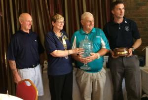 Club President Joan Greening with worthy first-time entrant winners Bushey Hall Ramblers